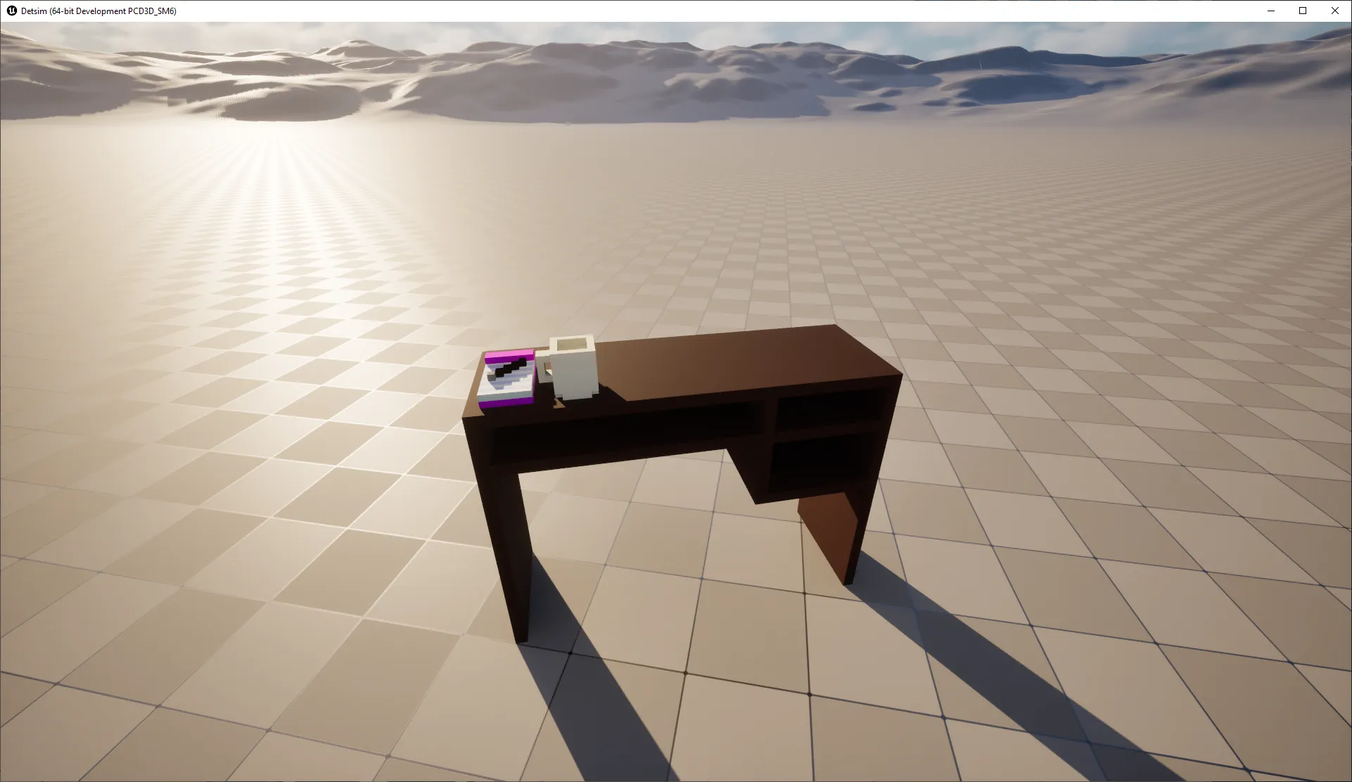 Desk with a notebook and coffee mug.